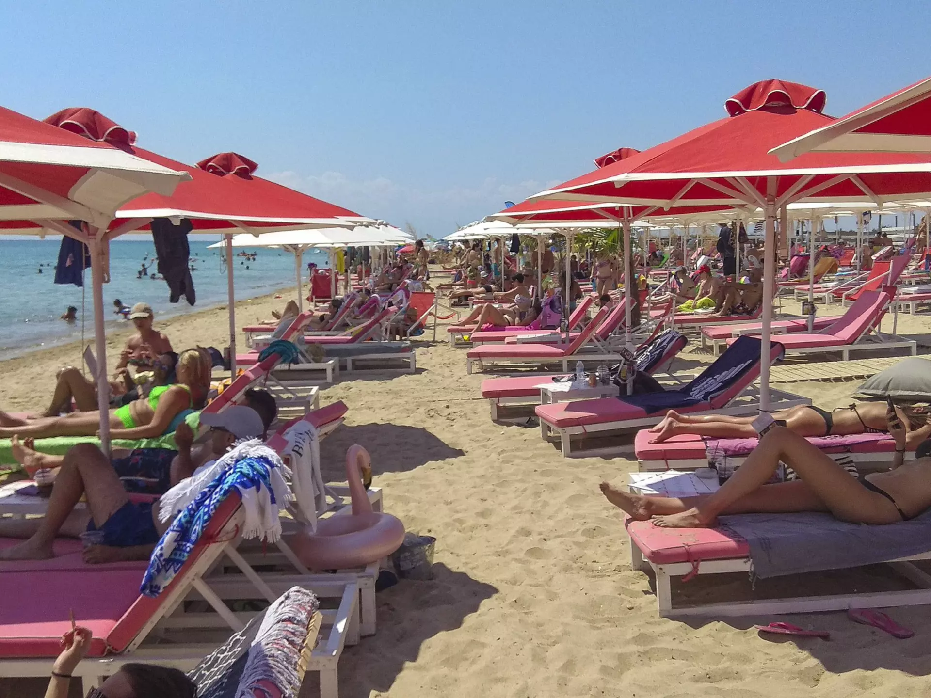 Greek activists are trying to reclaim public beaches from commercial operators © Getty Images