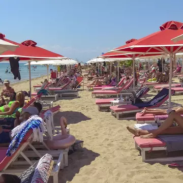 Greek activists are trying to reclaim public beaches from commercial operators © Getty Images