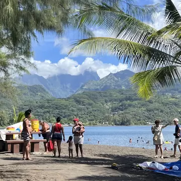 Islanders gather on the beach at Pointe Vénus in Tahiti.