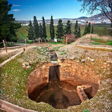 View of a Mycenaean vaulted tomb (Tholos) at the archaeological site of Ancient Dimini in Greece.