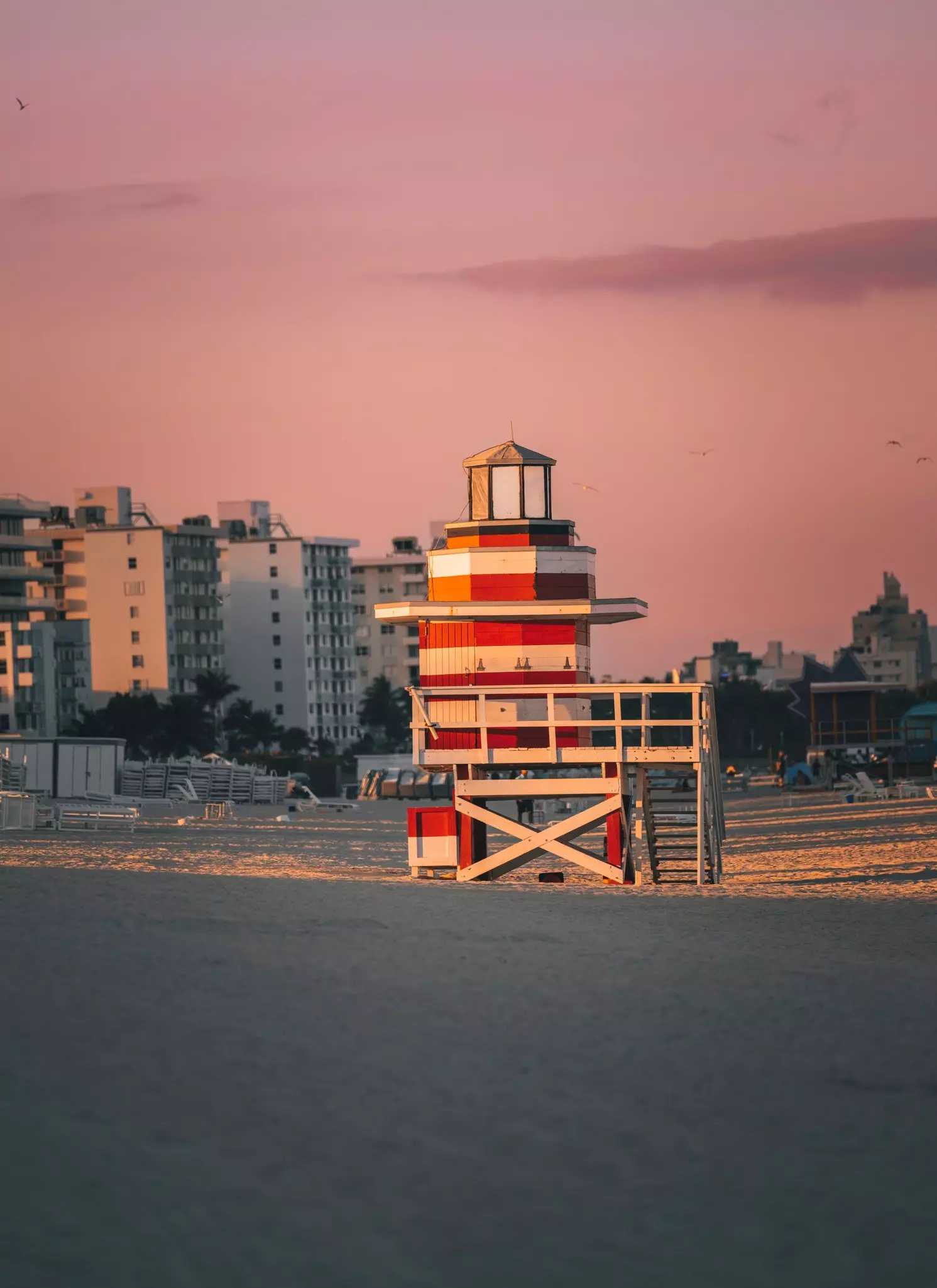 A lifeguard tower at sunset on South Beach