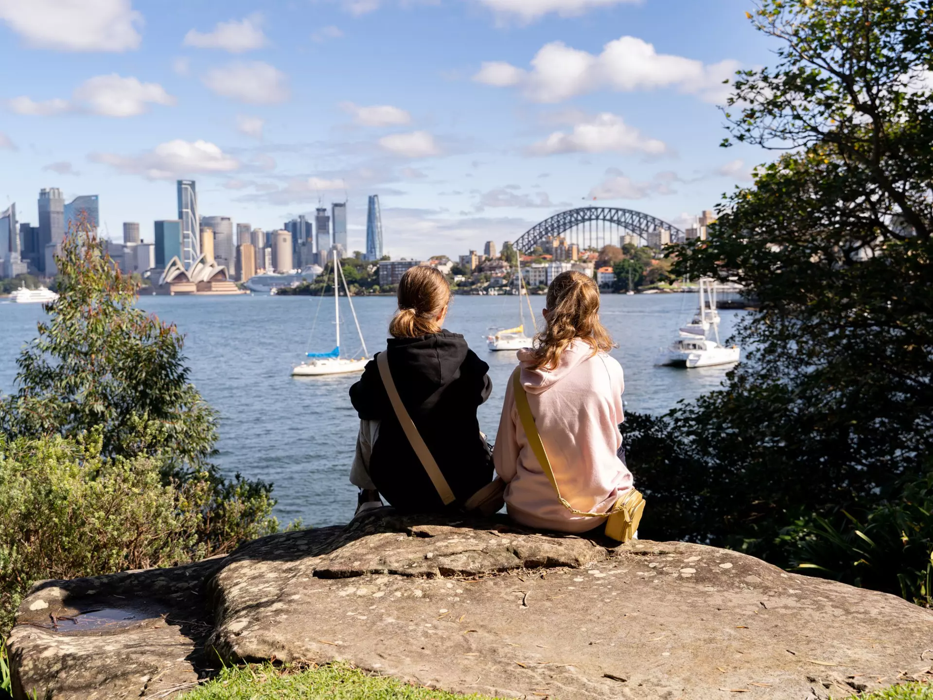 Children admiring the view of the Opera House from Cremorne Point in Sydney. Julia Gomina/Getty Images