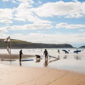 Newquay, Cornwall - August 2015:People surfing on Fistral Beach., License Type: media, Download Time: 2024-12-18T22:12:45.000Z, User: meg3348277, Editorial: true, purchase_order: 56530 - Guidebooks, job: Global Publishing-WIP, client: England 13, other: Megan Cassidy