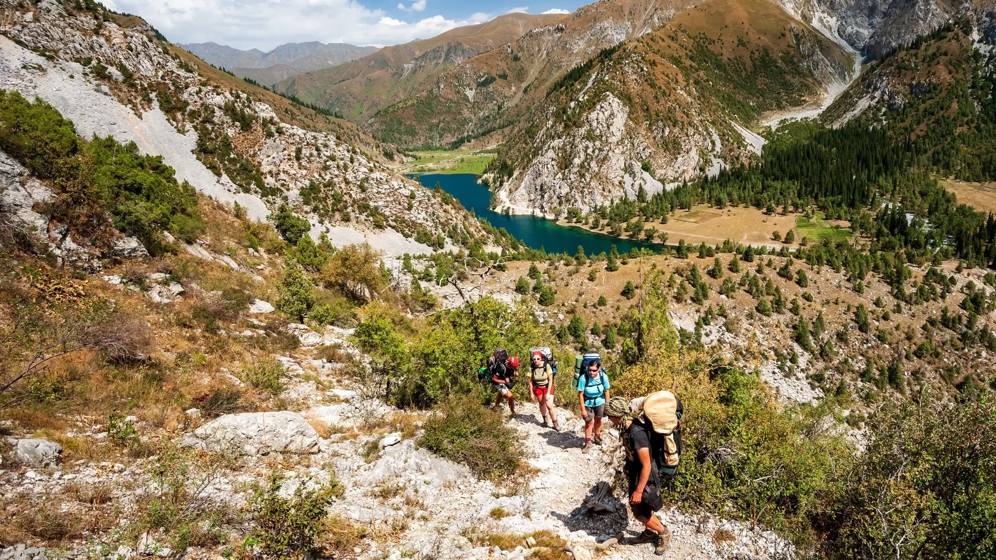 Hiking in Kyrgyzstan is thrilling – and not just for advanced trekkers. These seven ideas appeal to walkers of all levels. Shutterstock