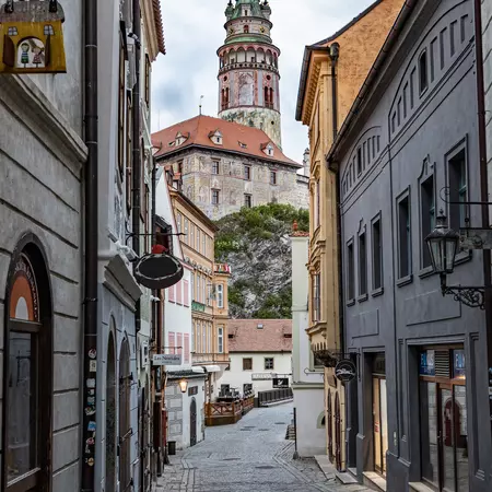 Cesky Krumlov, Czech Republic. View of the Tower of the Krumlov castle from narrow street in the city center. South Bohemia  License Type: media  Download Time: 2021-02-19T12:37:11.000Z  User: AMccarthy_lonelyplanet  Is Editorial: No  purchase_order:   