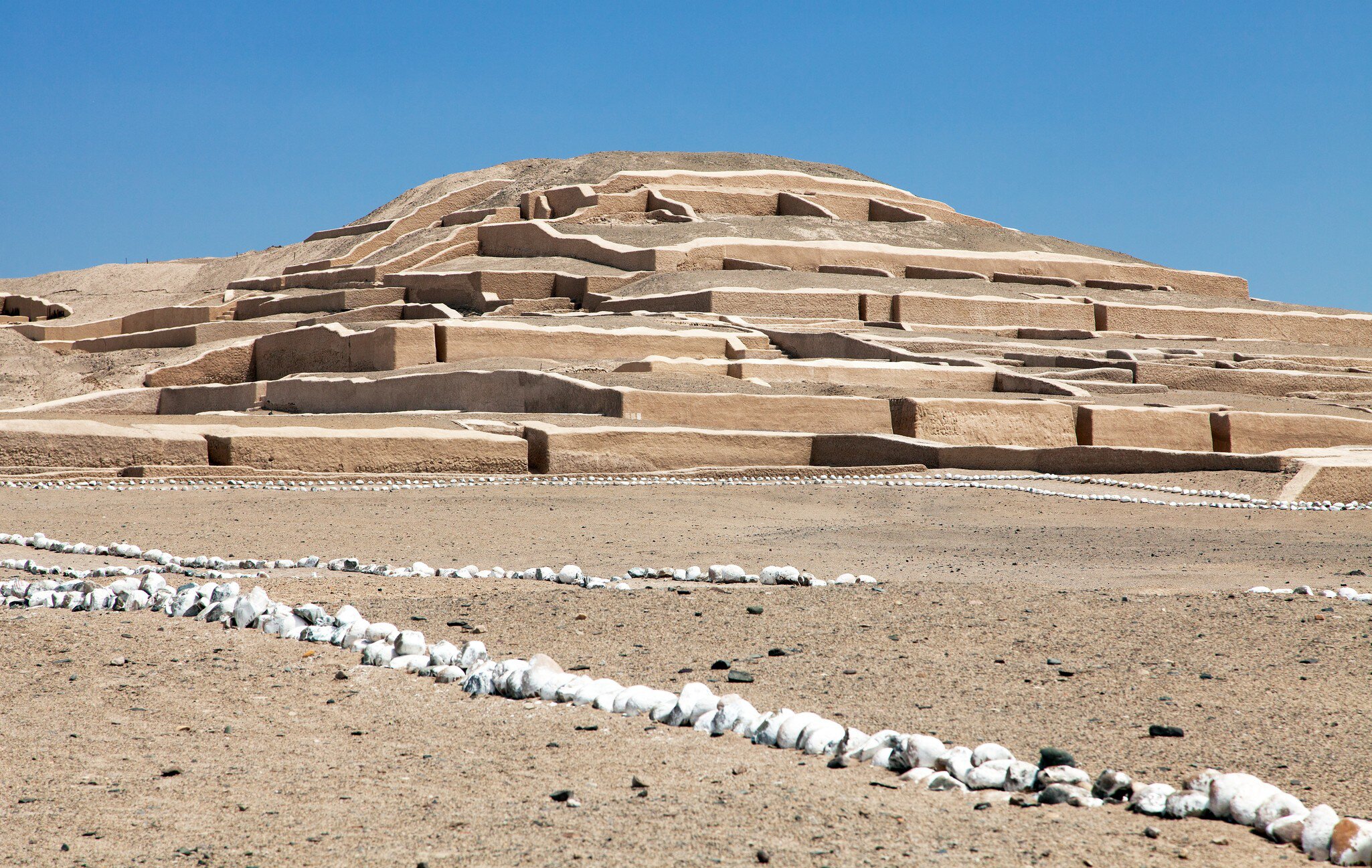Nazca pyramid at Cahuachi archeological site in the Nazca desert of Peru.