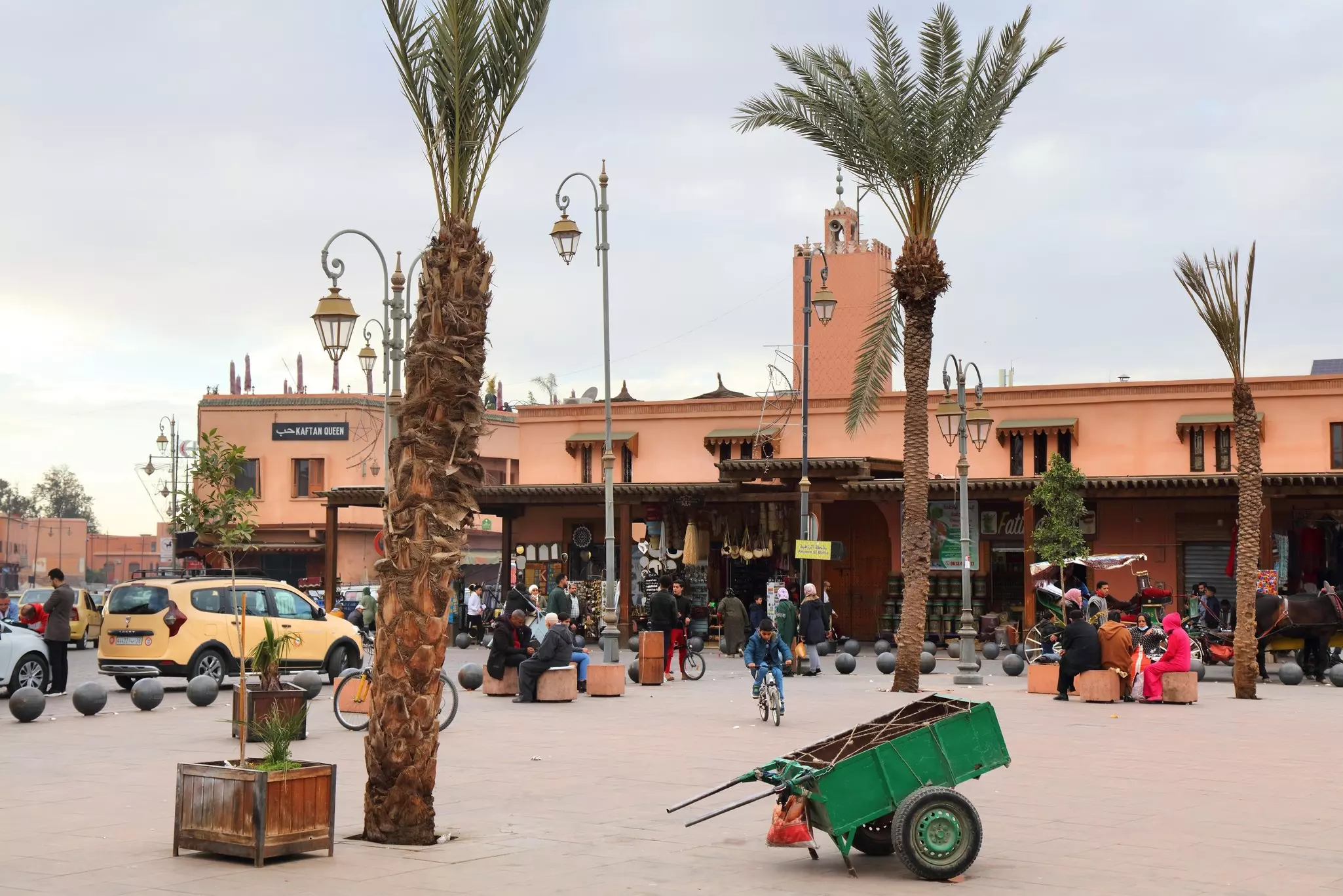 MARRAKECH, MOROCCO - FEBRUARY 20, 2022: People visit Place des Ferblantiers city square of Marrakech city, Morocco.