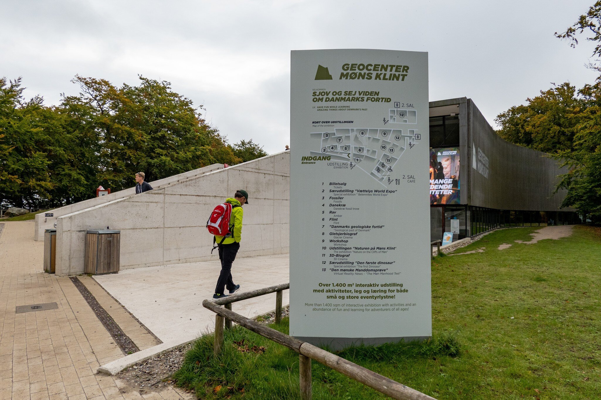 Monsklint, Denmark. A man walking at the entrance the Geocenter Museum.