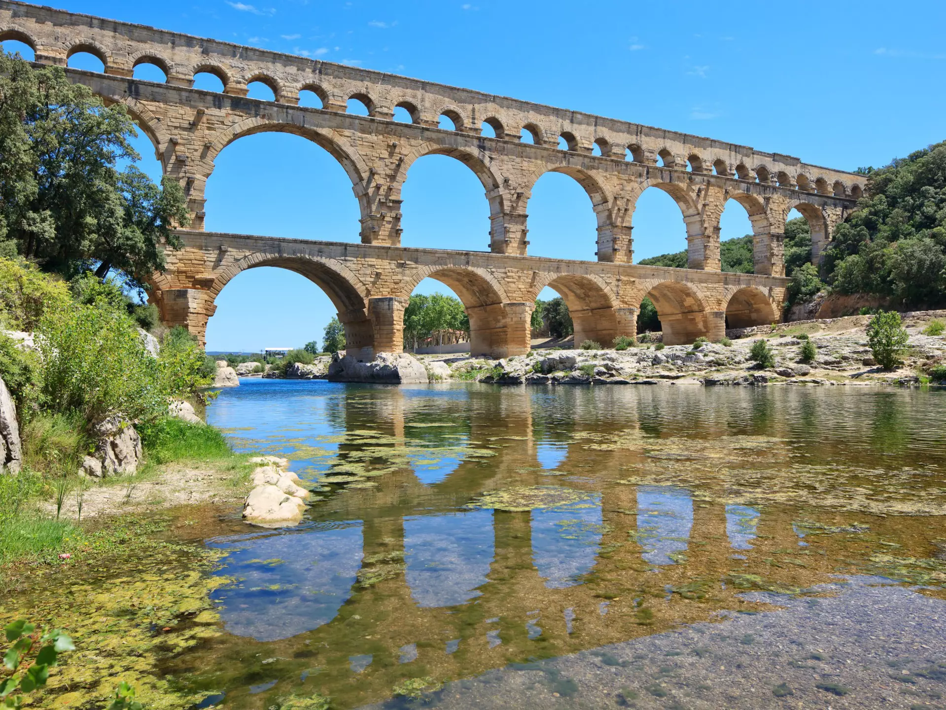 The impressive Pont du Gard aqueduct is one of the lasting legacies of the Roman-era. StevanZZ / Shutterstock