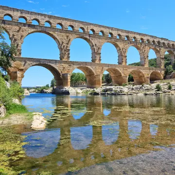 The impressive Pont du Gard aqueduct is one of the lasting legacies of the Roman-era. StevanZZ / Shutterstock
