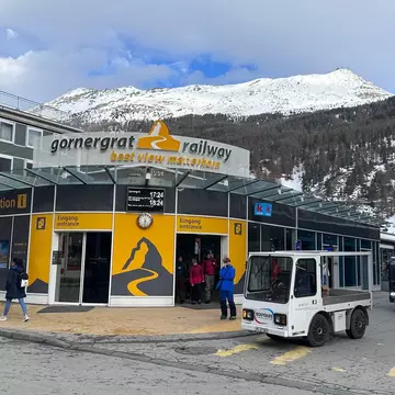 Zermatt, Switzerland - March 29, 2024 : Entrance of the Gornergrat Railway train station in Zermatt, Canton of Valais, Mattherhorn, Switzerland, License Type: media, Download Time: 2025-12-03T18:51:08.000Z, User: fabricencoredesign31, Editorial: true, purchase_order: 56530 - Guidebooks, job: Global Publishing-WIP, client: Experience Switzerland 1, other: Fabrice Robin
