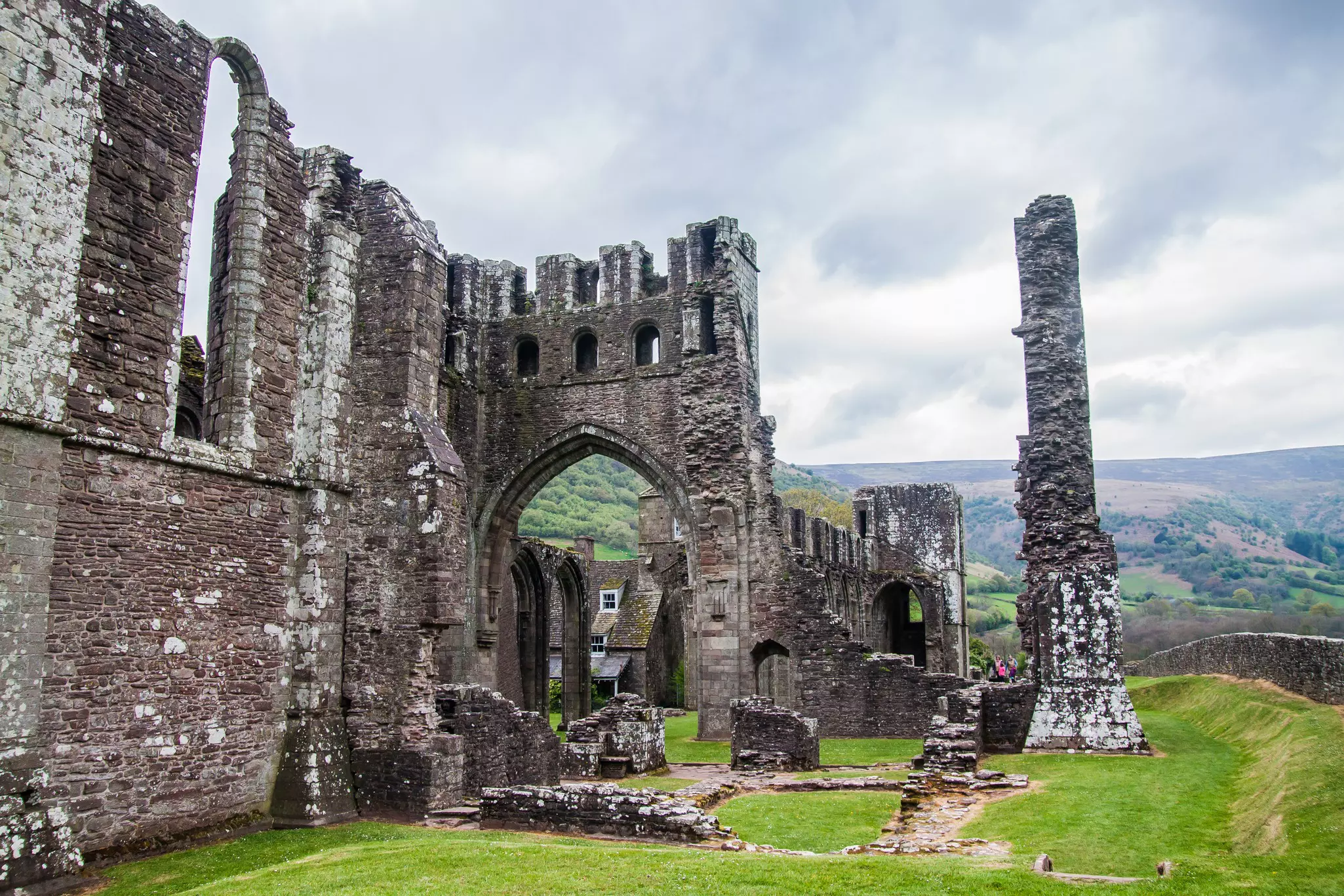 Ruins of a priory in a hilly rural area