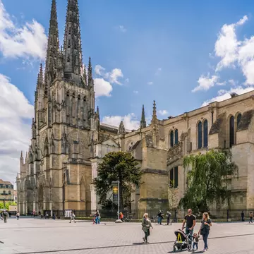 Tourists passing the Famous Cathadrale Saint-Andre de Bordeaux, France. 