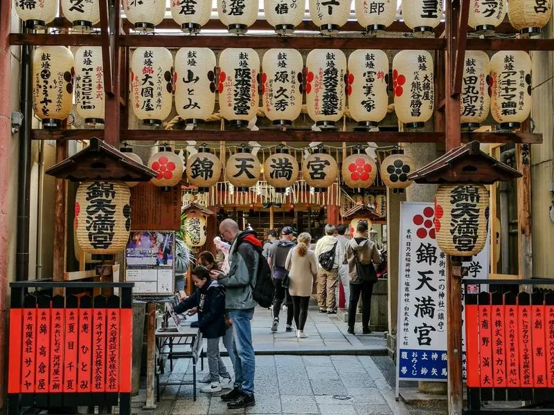 Kyoto, Japan October 28 2023, several tourists visit the Nishiki Tenmangu Shrine which is located in the Nishiki traditional market area, License Type: media, Download Time: 2025-02-27T17:56:17.000Z, User: rhylton_redventures, Editorial: true, purchase_order: 56530 - Guidebooks, job: Lonely Planet WIP, client: Lonely Planet WIP, other: Rhianydd Hylton
