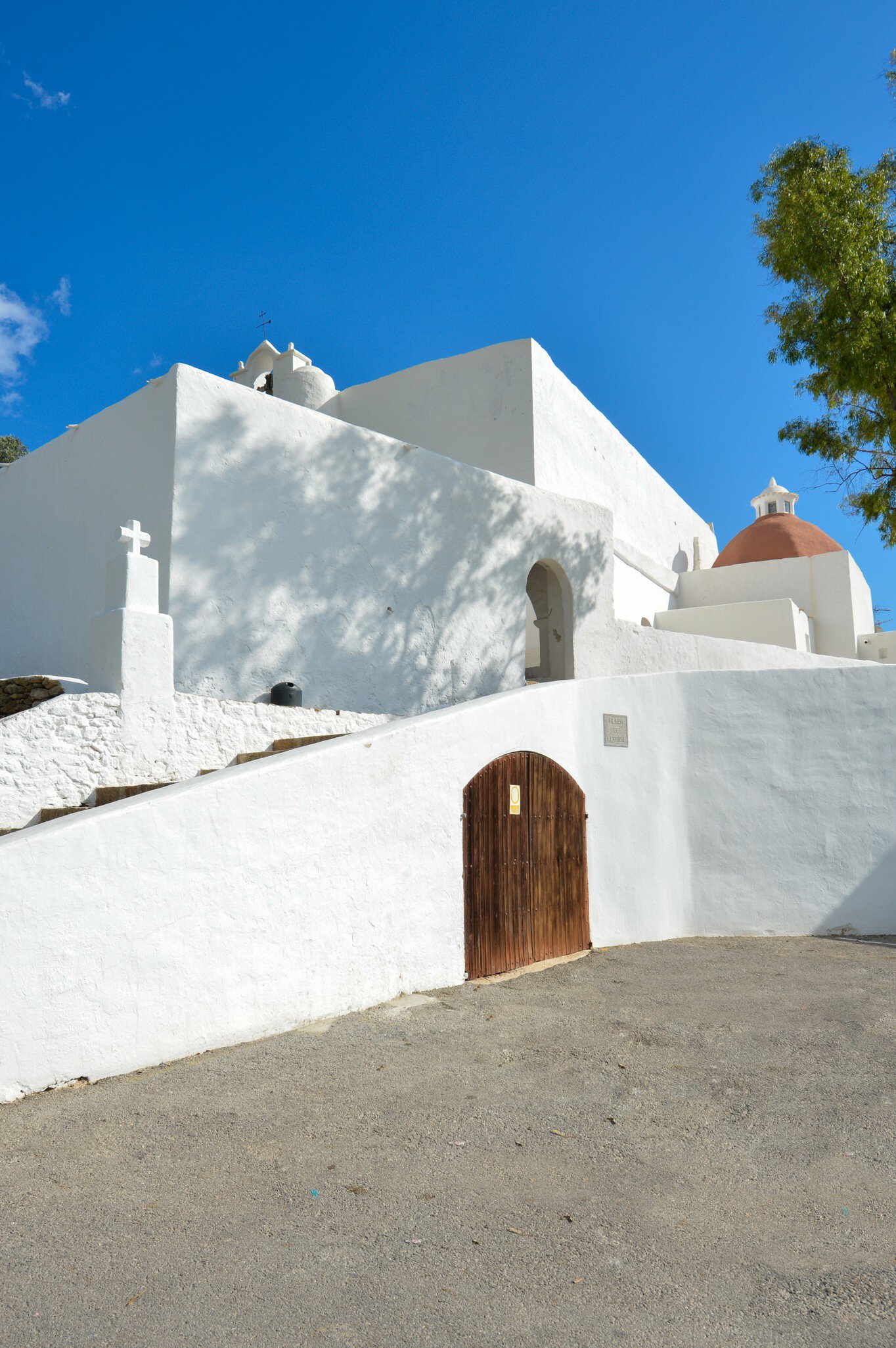 View of the whitewashed walls of the Església de Puig de Missa on the island of Ibiza in Spain.