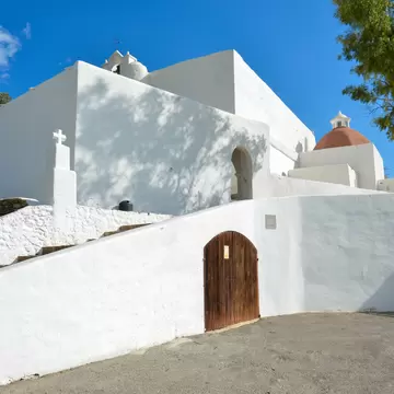 View of the whitewashed walls of the Església de Puig de Missa on the island of Ibiza in Spain.