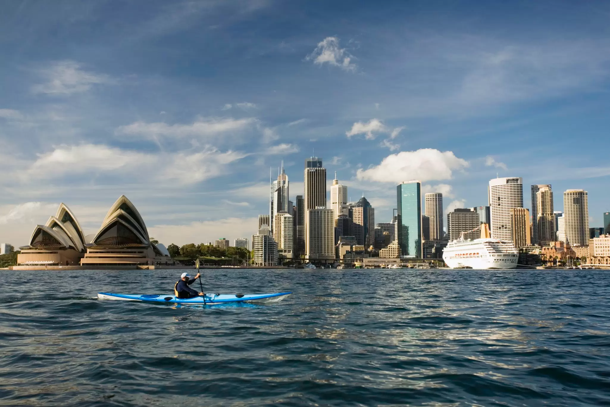 Sydney is best experienced on the water - book a tour to paddle, kayak or surf-ski in one of the most iconic harbors in the world © Michele Westmorland / Getty Images