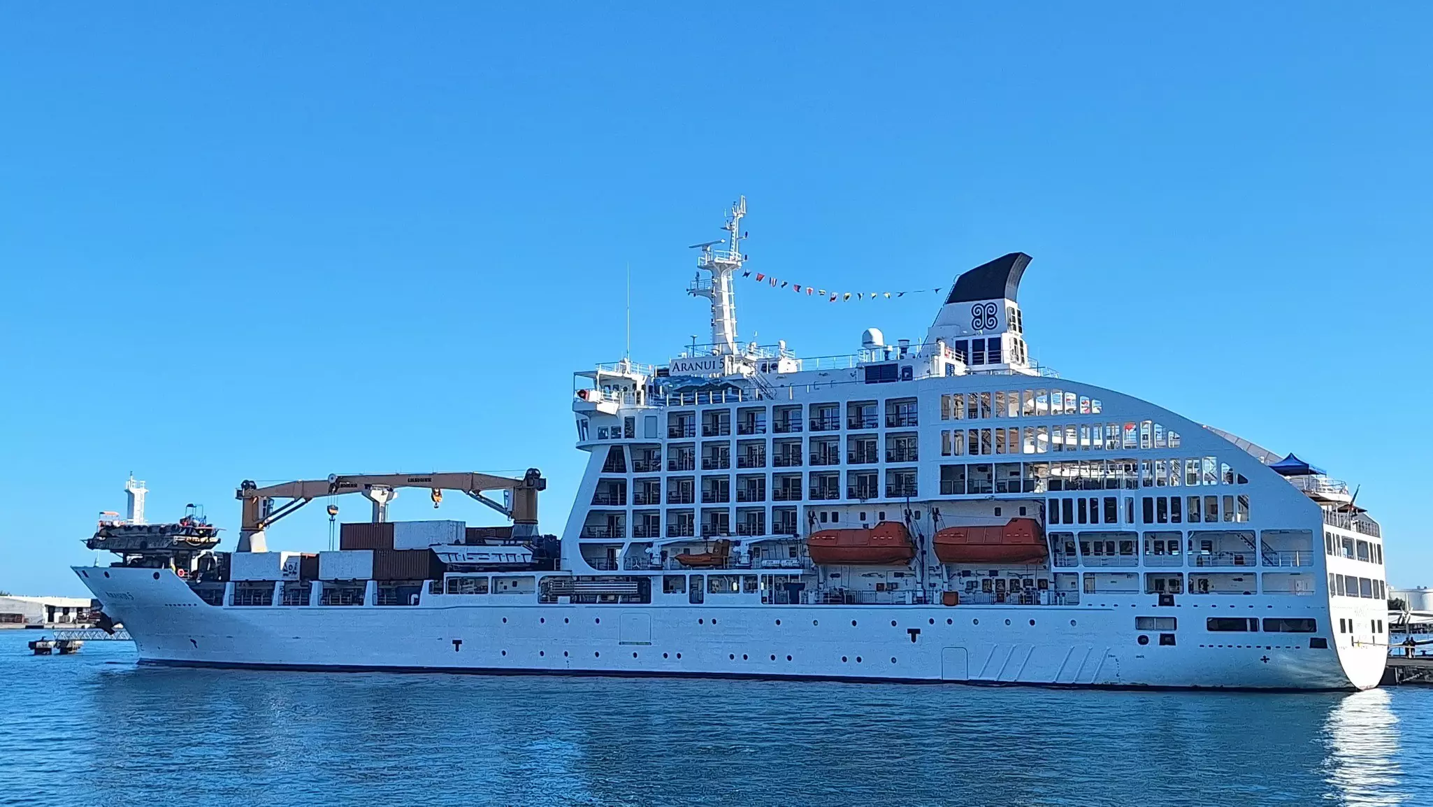 A large white ship on water