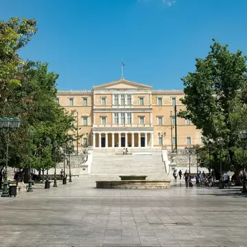 View over Plateia Syntagmatos towards the Parliament building in Athens, Greece.