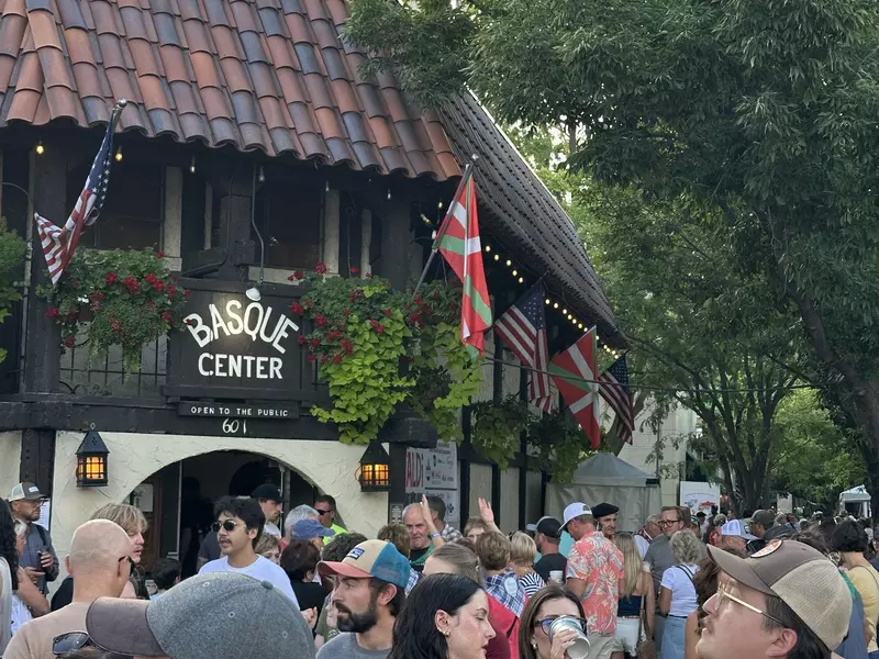 The Basque Center has timbered  architecture and greenery adorning it. 