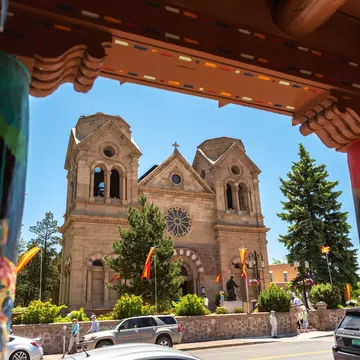 The exterior of a cathedral basilica on a sunny day