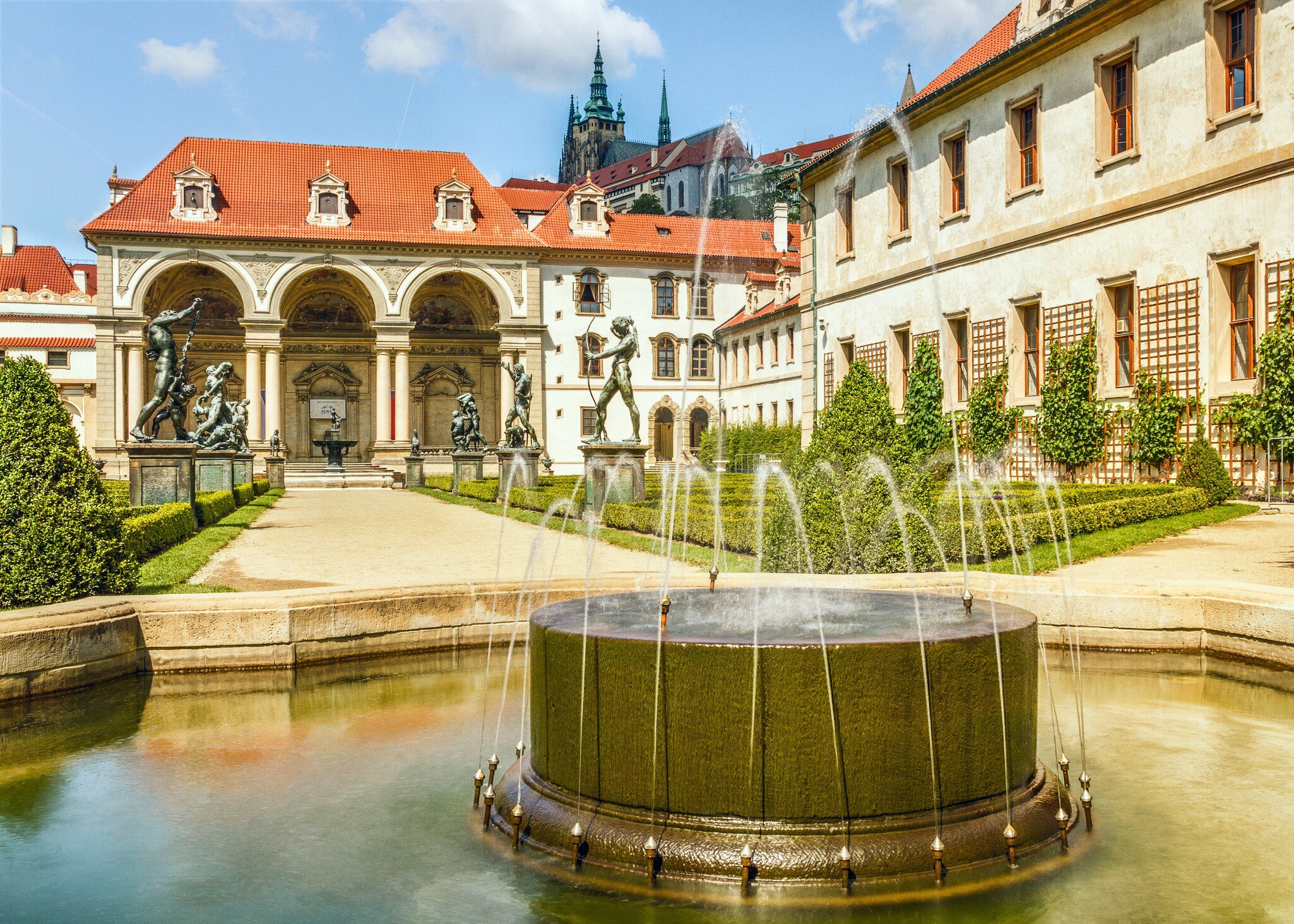 Wallenstein Palace in Mala Strana, Prague, Czech Republic. Statues and fountain outside the facade.
