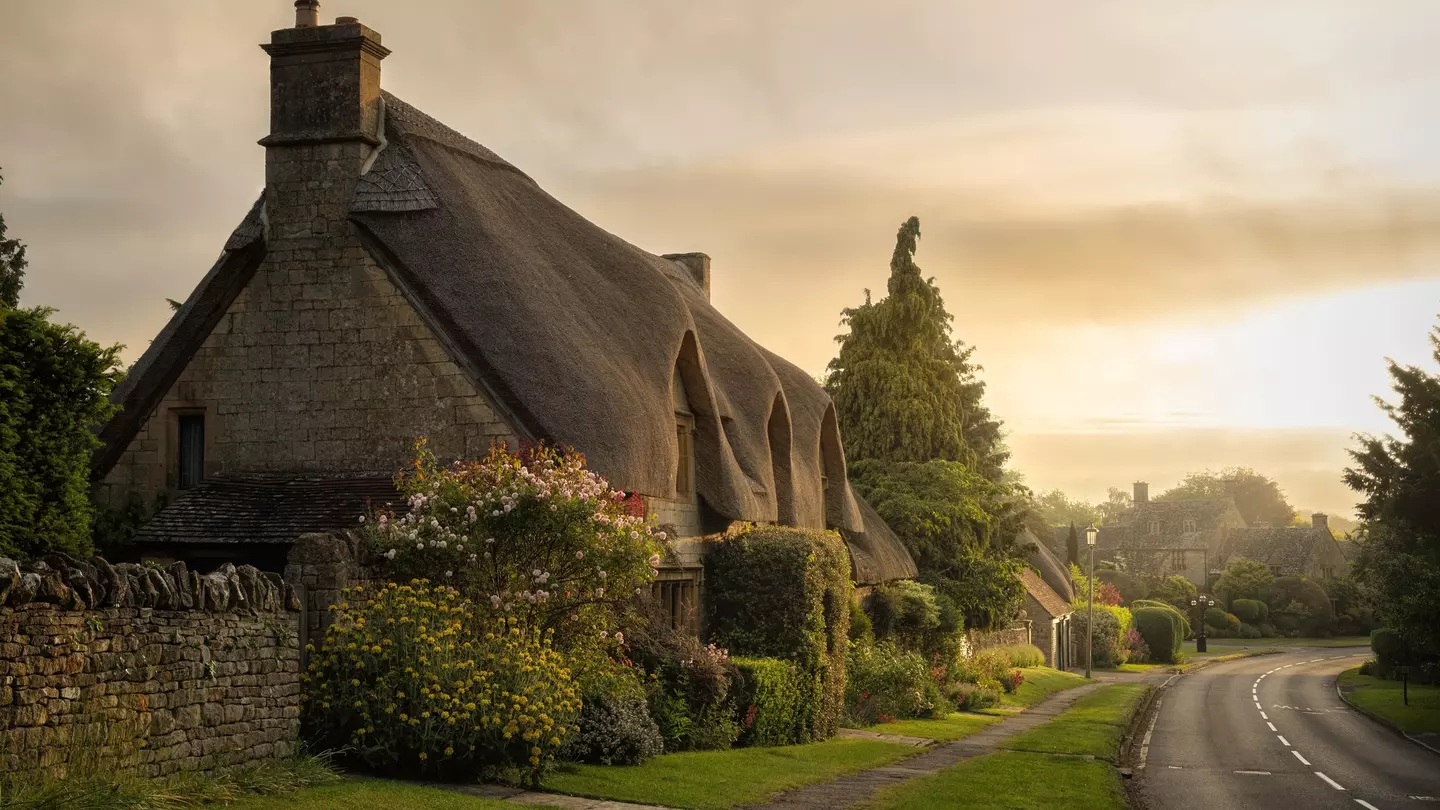 English chocolate box house with thatched roof