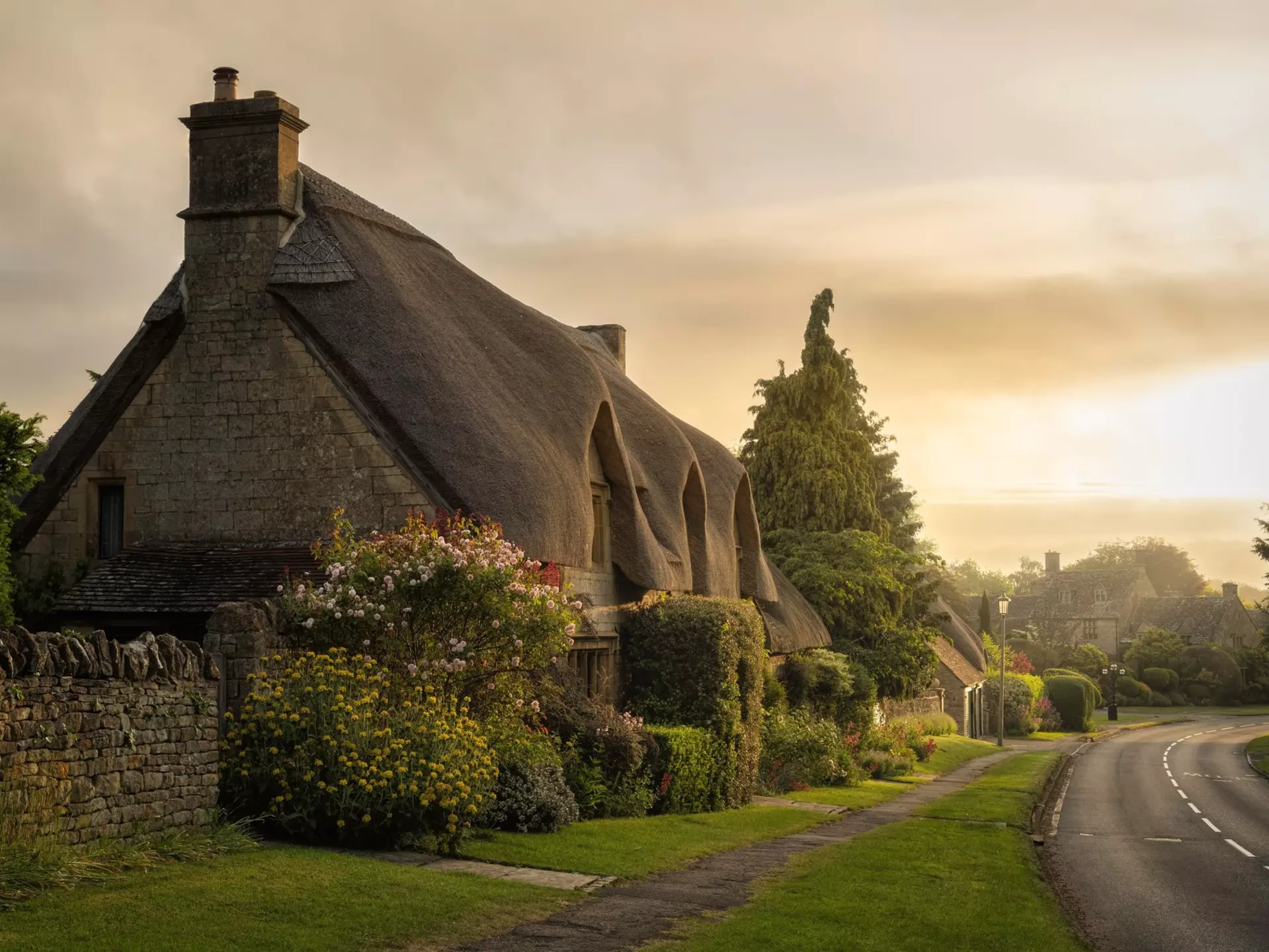 English chocolate box house with thatched roof