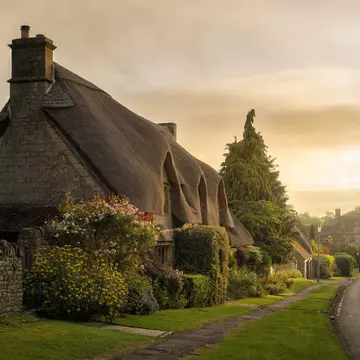 English chocolate box house with thatched roof