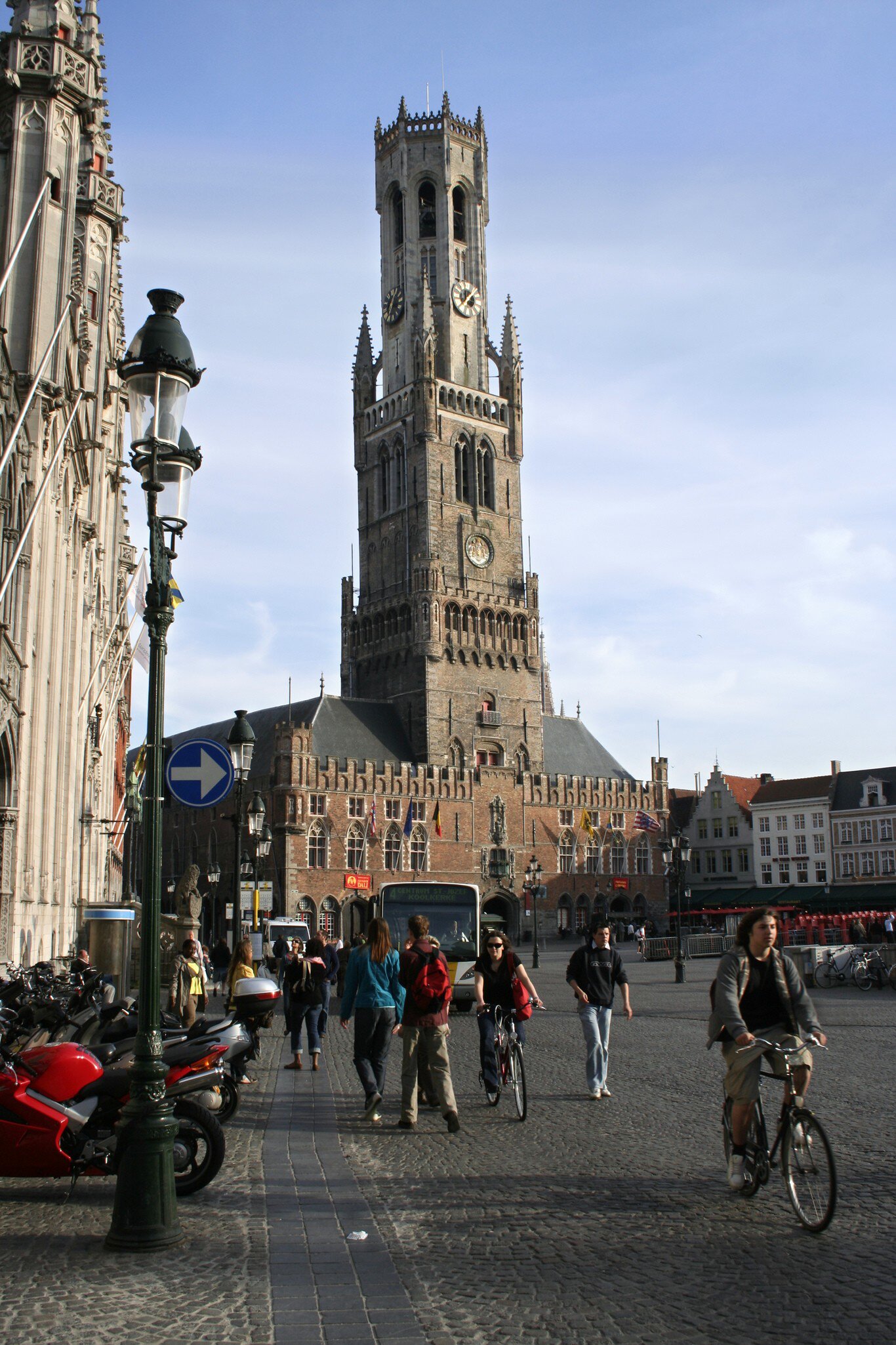 Belfort on Markt.
26493-37
Belgium, Bruges, Europe, West-Vlaanderen, architecture, bicycle, building exterior, capital cities, casual clothing, cloud, culture, day, group of people, historic, large group of people, lighting, low angle view, mixed age range, modern, motorcycle, non-motorised vehicle, outdoors, people, site, sky, street, street light, tower, transport, transportation, travel destinations, urban, urban scene, vehicle, vertical, weather, window, world heritage