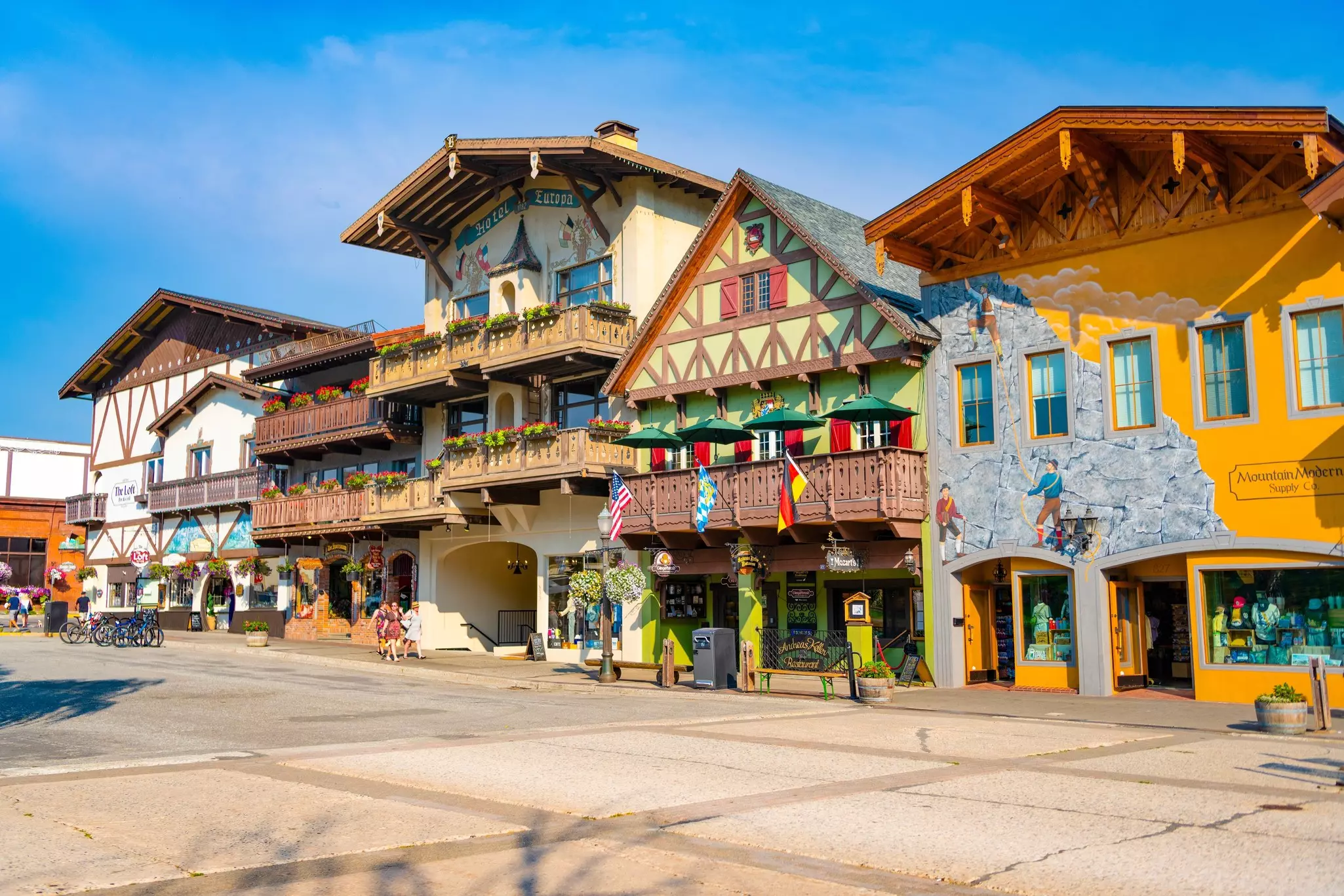 Quaint Bavarian building in old town. Bavarian village. Bavarian village of Leavenworth, Washington with themed sidewalk shop on the street