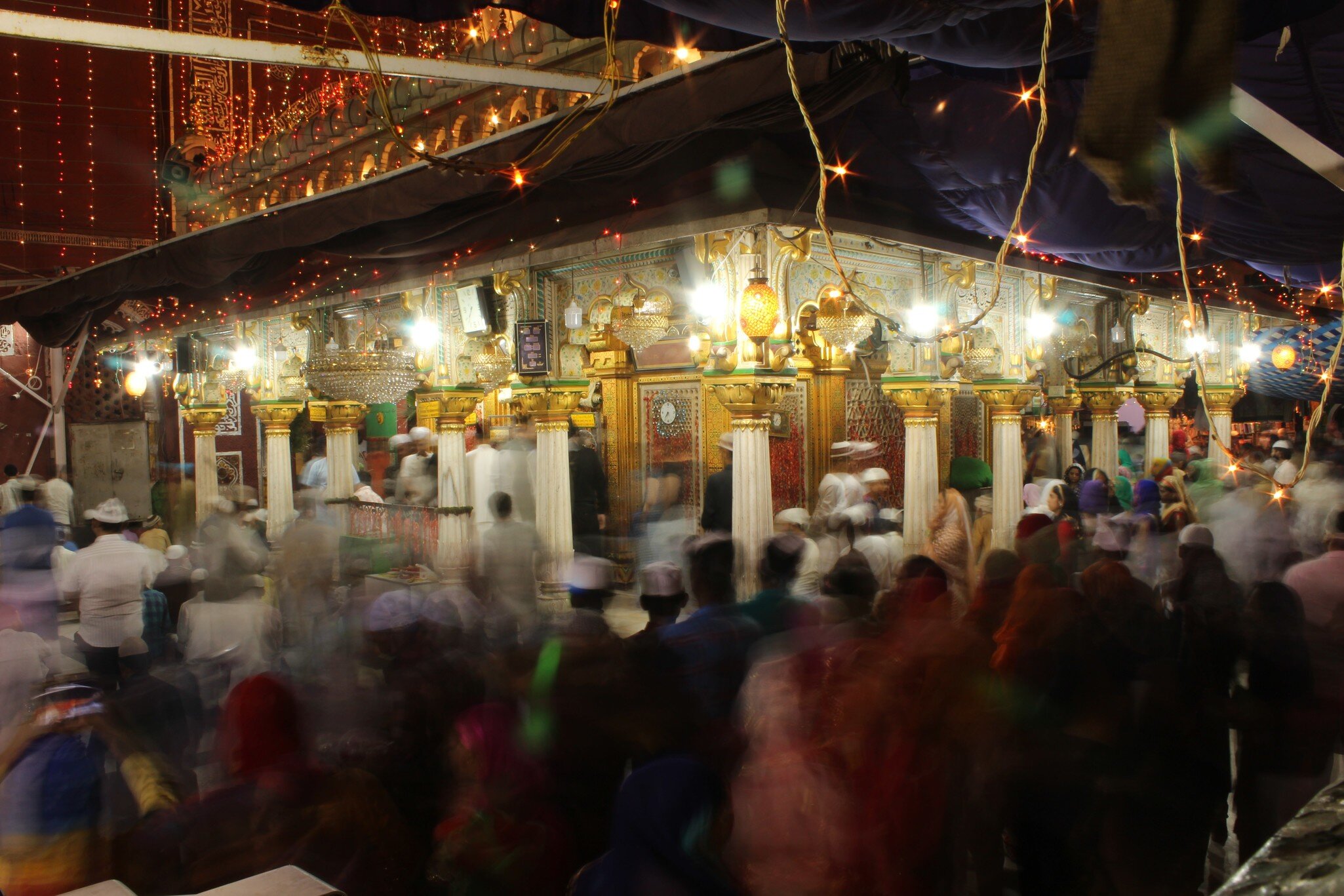 MAY 23, 2018: Long exposure of people reading prayers in the Hazrat Nizamuddin Dargah Complex, after the Iftar ceremony.
1099521902
asia, celebration, crowd, culture, dargah, delhi, faith, fasting food, fasting in ramadan, fasting month, fasting ramadan, festival, holy month, incredible india, india, islam, landmark, lights, muslim, night, nizamuddin, people, ramadan, ramzan, religion, street, traditional