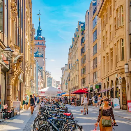 Main shopping street people on a sunny day in Leipzig.