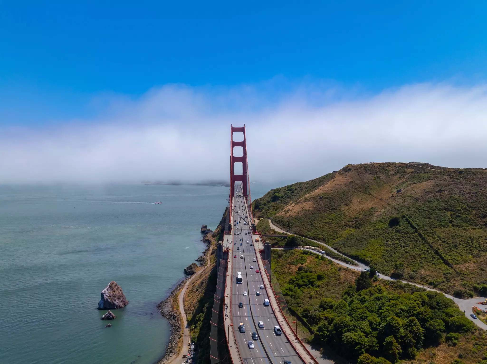 Golden Gate Bridge north tower in the fog at San Francisco Bay, city of San Francisco, California CA, USA. 