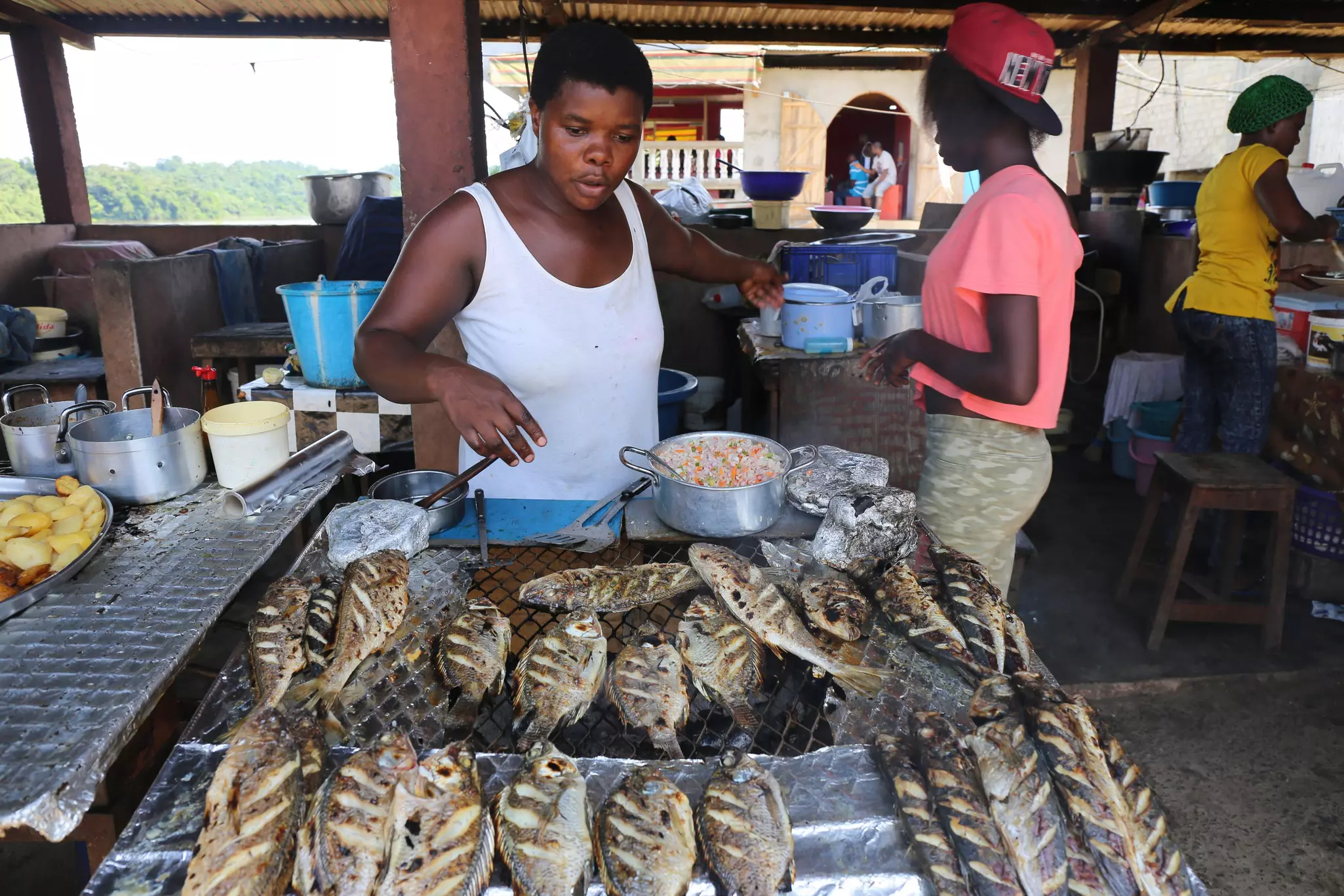 A meal of freshly grilled, perfectly spiced fish and meat is a your reward after a day of wildlife spotting in Gabon © BOULENGER Xavier / Shutterstock