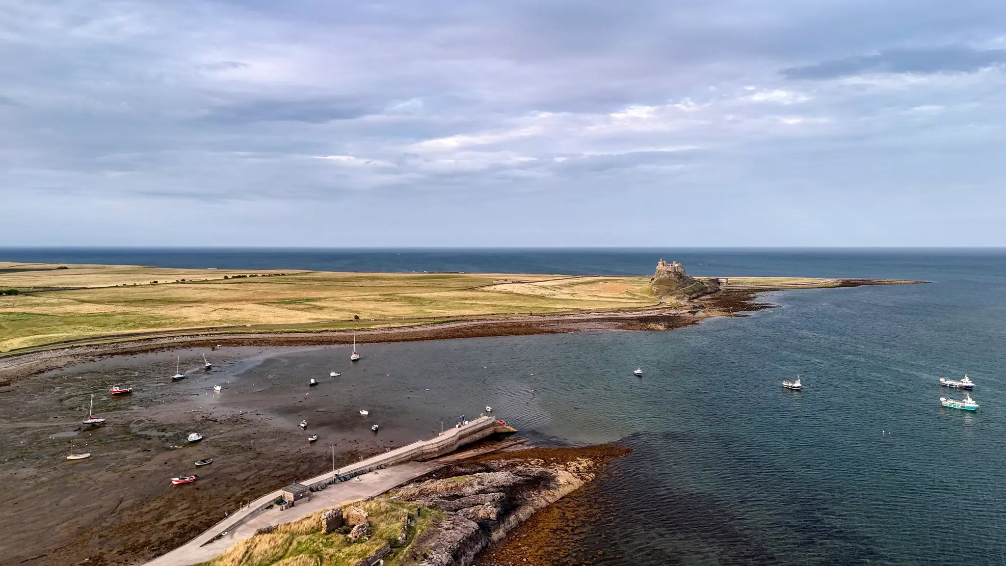 drone shot of Lindisfarne castle on holy island. 