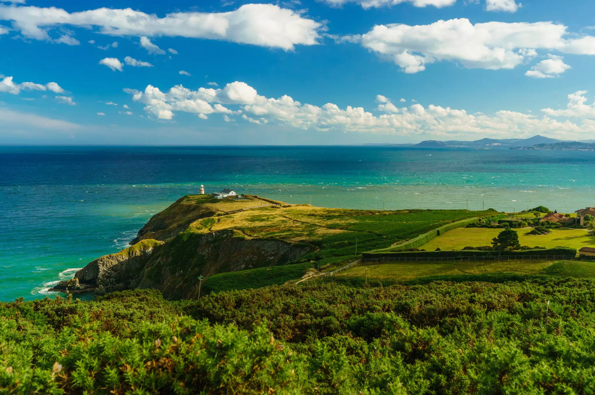 Head to nearby Howth for its top-notch seafood and gorgeous coastal views. Xin Tan / 500px