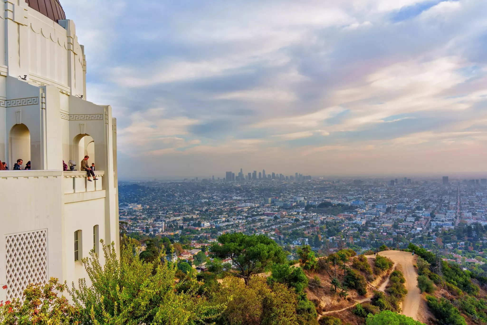 Stunning view from Griffith Observatory, featuring visitors alongside the breathtaking skyline of Los Angeles.