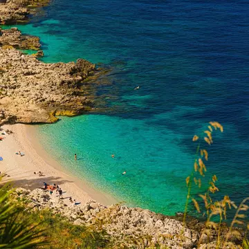 Paradise empty beach with no people and turquoise sea named 'Cala Capreria' at the natural reserve “Riserva dello Zingaro”, Scopello, Sicily, Mediterranean Sea, Italy., License Type: media, Download Time: 2026-03-05T19:28:58.000Z, User: LP_YKhanna, Editorial: false, purchase_order: 65050 - Digital Destinations and Articles, job: LP, client: Journeys, other: Yuvraj Khanna