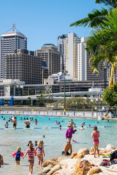 Australia, Queensland, Brisbane, Southbank Parklands Streets Beach sunbathers sand water Central Business District CBD city skyline skyscrapers buildings. (Photo by: Jeff Greenberg/Universal Images Group via Getty Images)
Brisbane Comp
