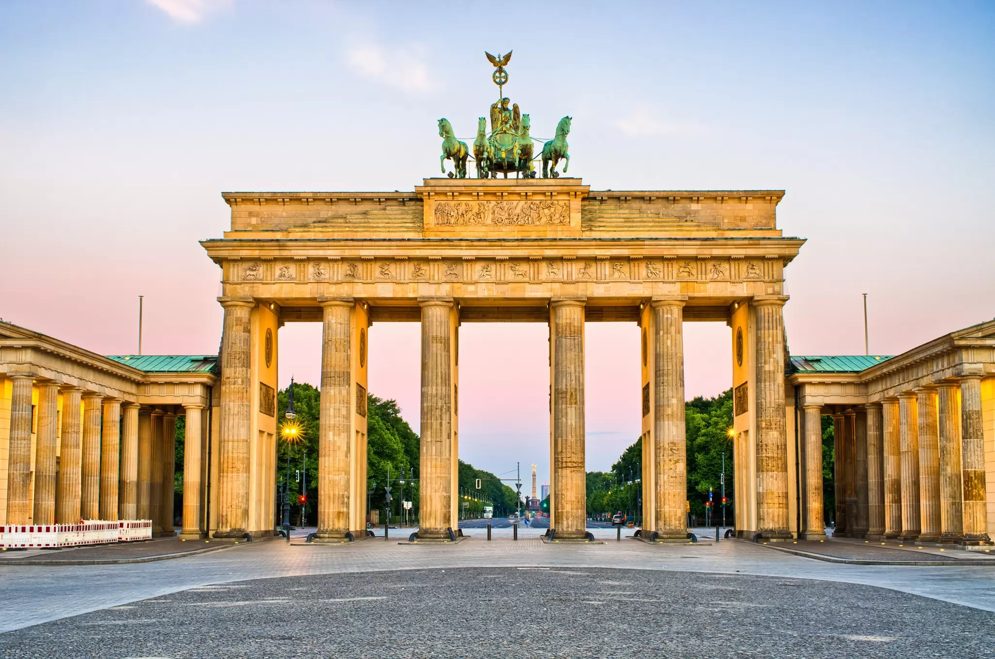 Brandenburg Gate during sunrise in Berlin, Germany.