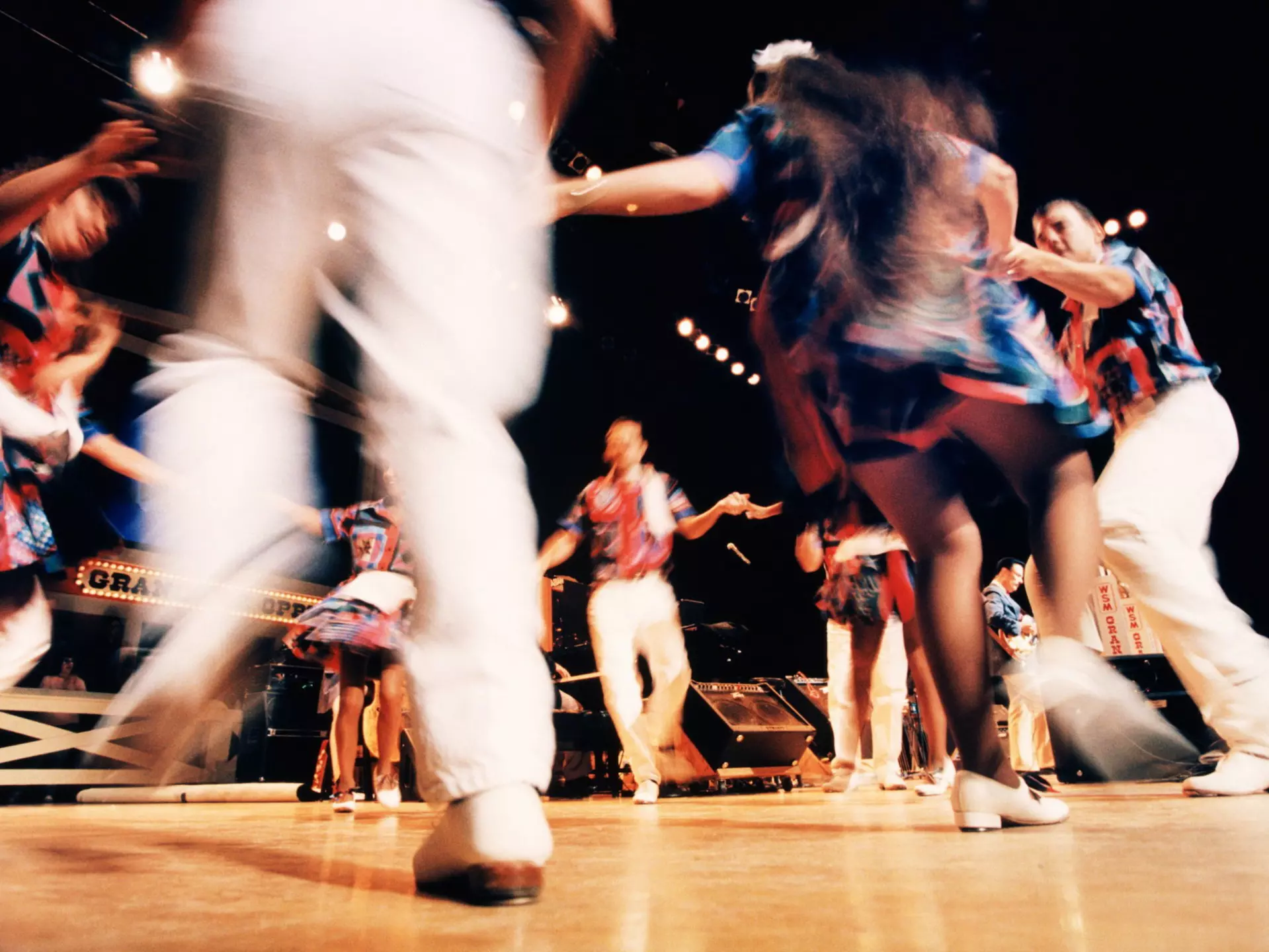 Blurred square dancers dancing in a circle at Grand Ole Opry concert hall.
EB3733-001
Group Of People, Arts Culture and Entertainment, People, C1