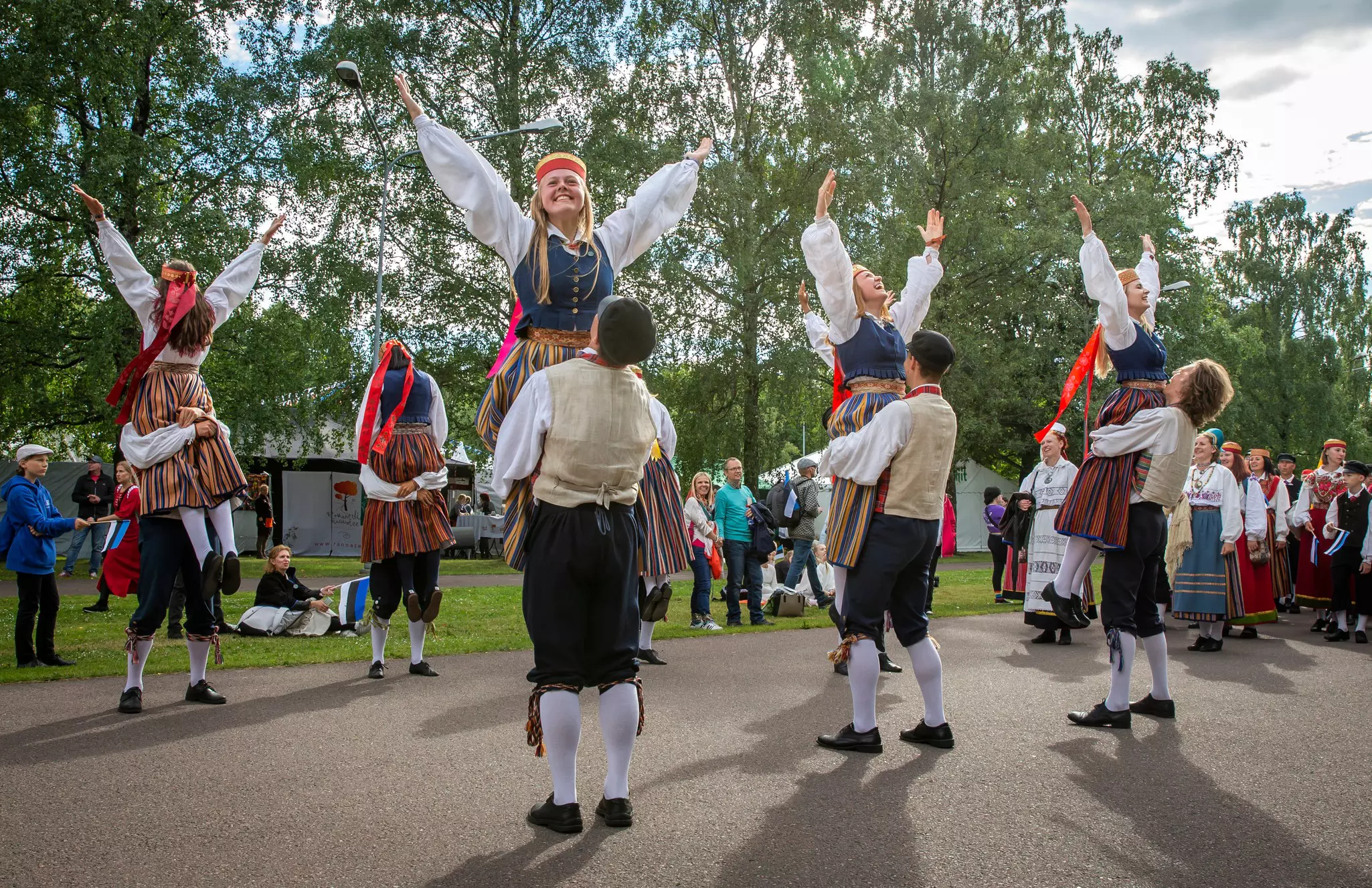 Estonian folk dancers in traditional clothing at the Singing Festival