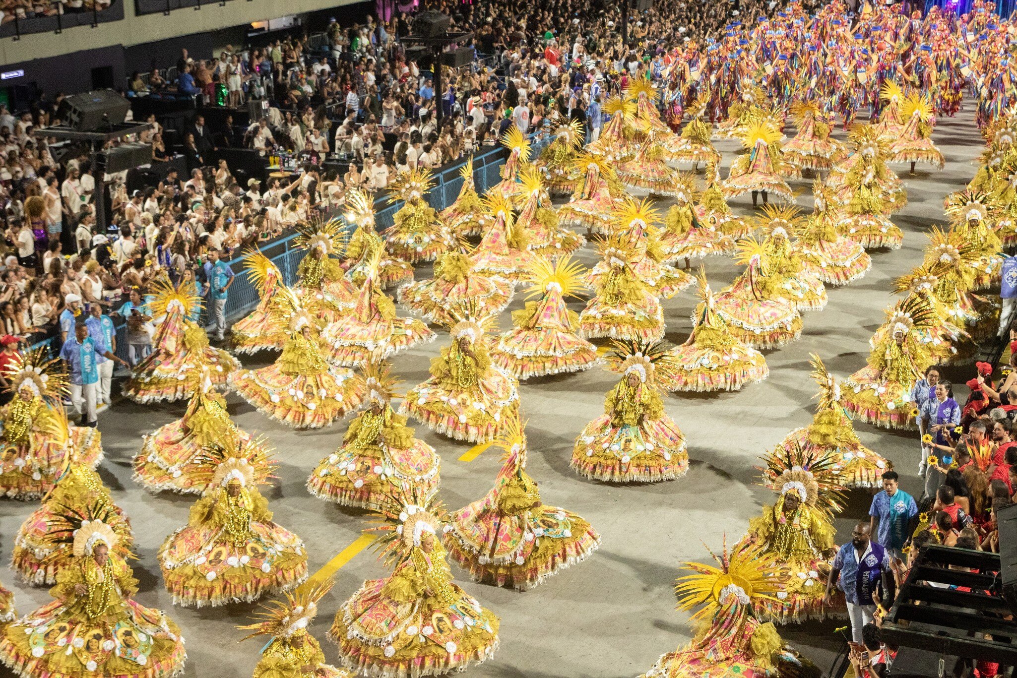 Revelers of Portela samba school perform along the Sambódromo during the annual Carnaval parade in Rio de Janeiro, Brazil.