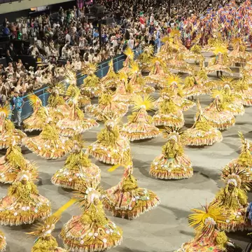 Revelers of Portela samba school perform along the Sambódromo during the annual Carnaval parade in Rio de Janeiro, Brazil.
