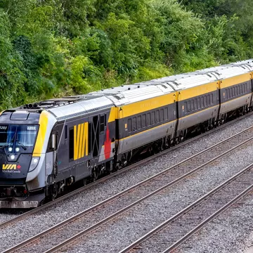 Toronto Canada, August 20, 2024; A full train view of a Via Rail sleek modern Siemens train set passing by a green forest area., License Type: media, Download Time: 2025-12-02T17:28:21.000Z, User: mvm_lonelyplanet, Editorial: true, purchase_order: 56530 - Guidebooks, job: Experience Canada 1, client: Global Publishing-WIP, other: Virginia Moreno