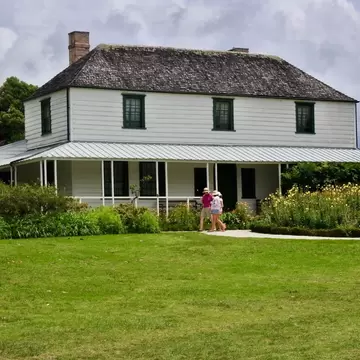 KERKERI, NZL - JAN 24 2023:The Mission House at Kerikeri in New Zealand built in 1822 by the Church Missionary Society. It's New Zealand's oldest surviving building sometimes known as Kemp House.; Shutterstock ID 2267157833;