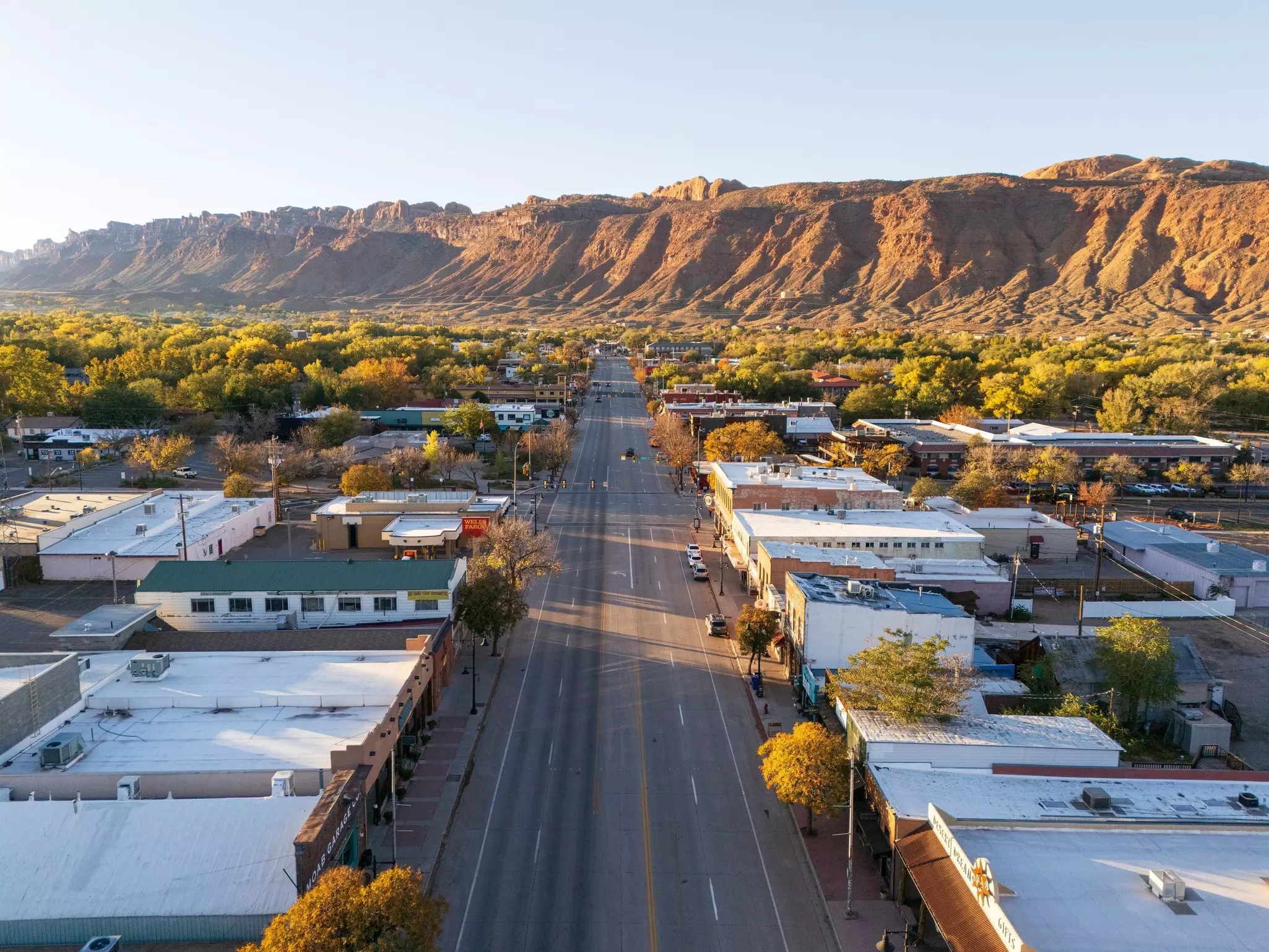 Aerial view over street in Moab, Utah, at sunrise.