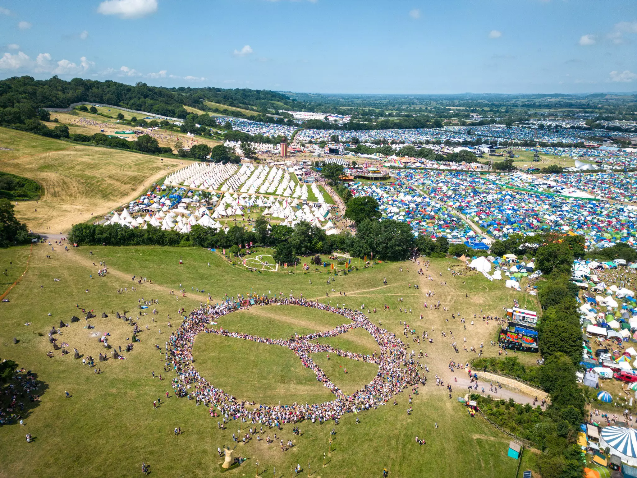 Peace sign made out of people at Glastonbury.