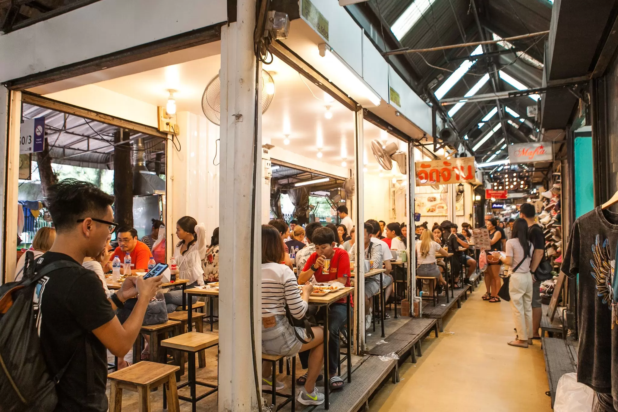 View of an eatery at Chatuchak Weekend Market in Bangkok, Thailand.